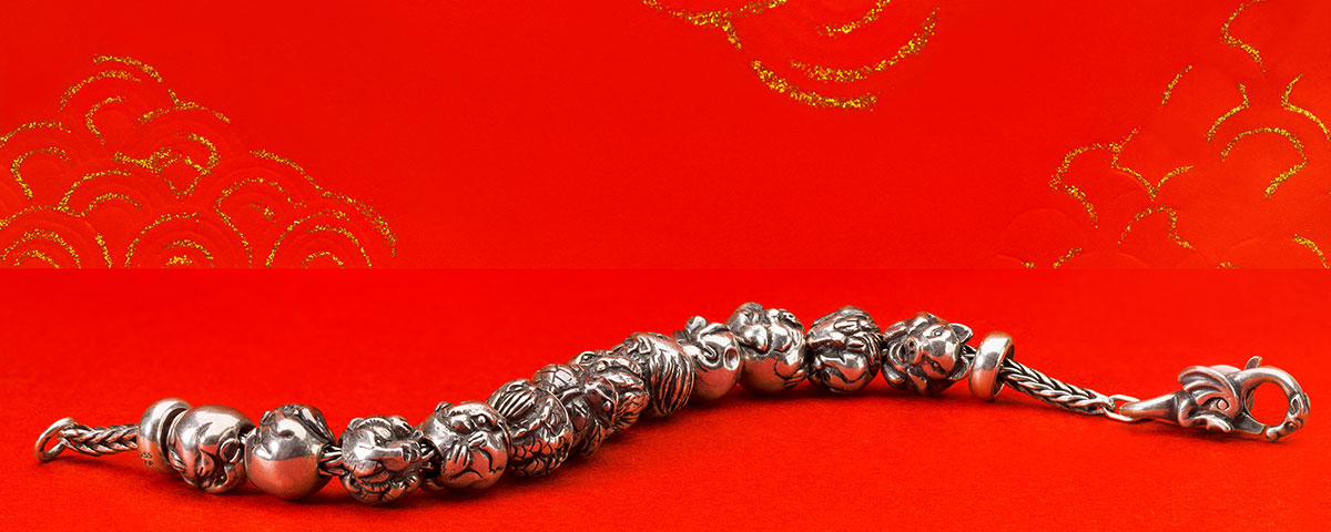 Perles du zodiaque chinois sur un bracelet en argent